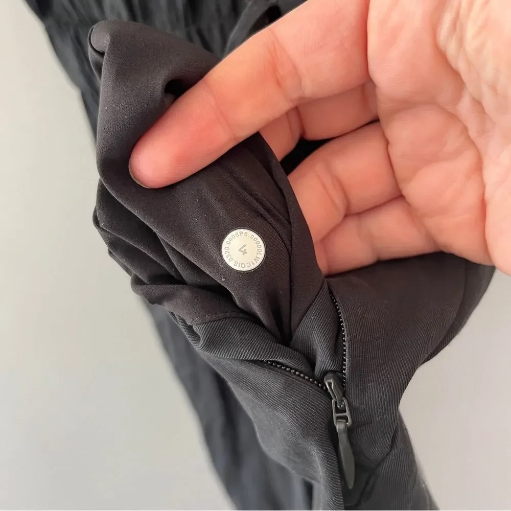 Lululemon Black Perfectly Poised Jumpsuit Short Sleeve Stretch Pockets Size 4